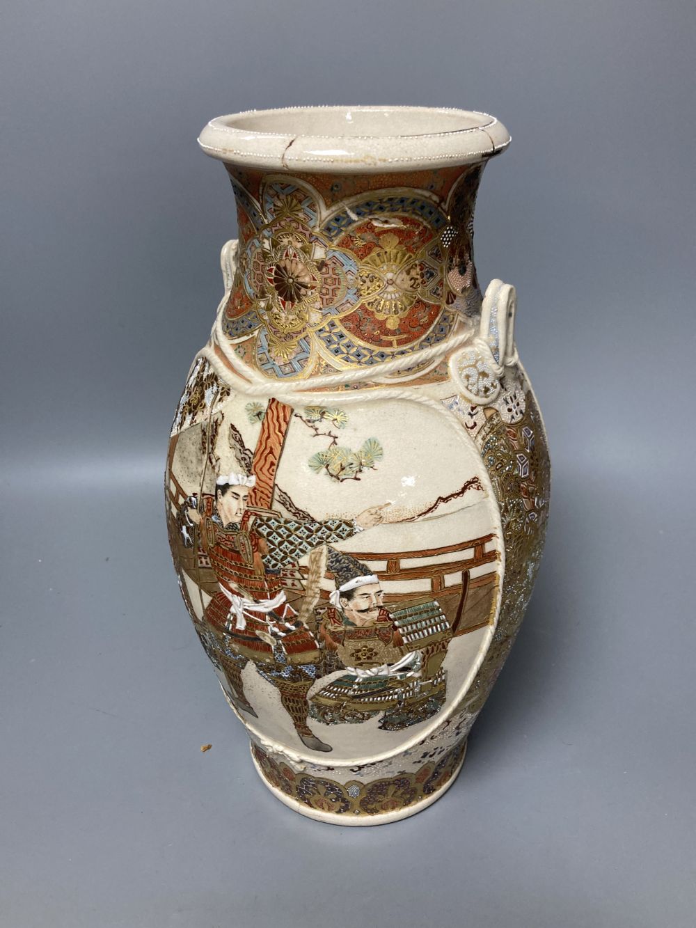 A Japanese satsuma vase, a tea cup and saucer and another vase, tallest 37cm